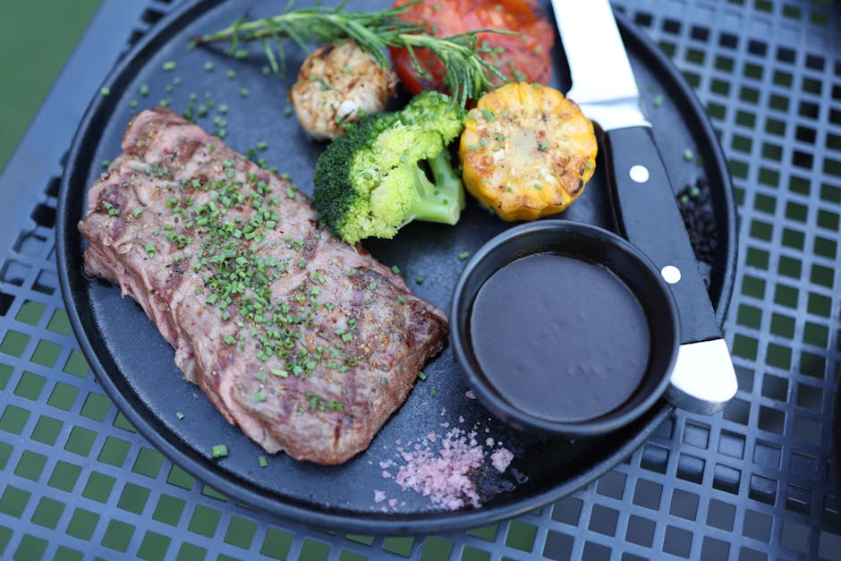 Elegant steak knife at fine dining table setting with professional presentation